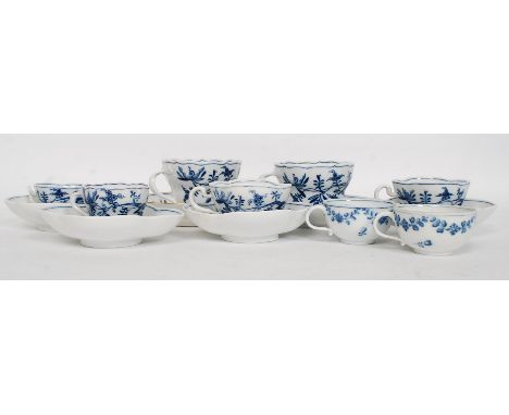 A collection of Meissen blue and white china - part tea service comprising teacups and saucers etc - each with blue crossed s