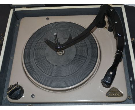 A vintage two tone Murphy portable four speed record player, in working order being recently serviced and PAT tested.
.

UK, 