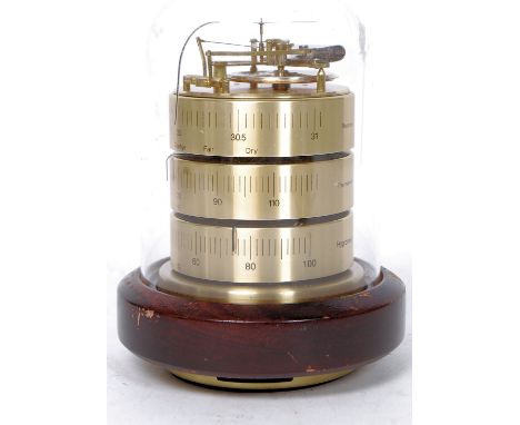 A vintage / retro brass German ? weather station barometer all set under a glass dome, having a barometer, thermometer and a 