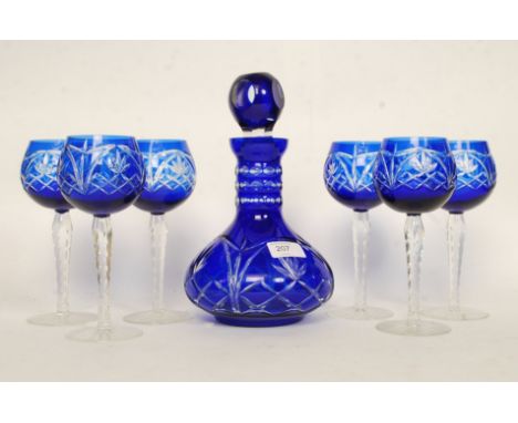 A 20th century Bohemian blue flash cut glass decanter and goblet set. Comprising 6 goblets and one decanter with stopper. H26