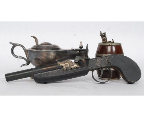 A group of novelty lighters to include a silver plated Dunhill genie lamp lighter marked to base Dunhill - Made in England Pa
