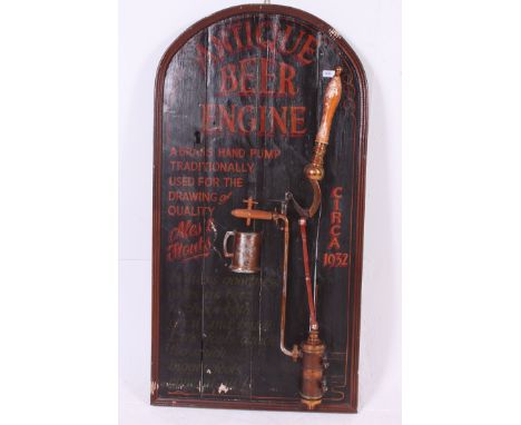 A large decorative pub sign 'Antique beer' complete with a vintage beer pump having working action. Painted wooden panel with