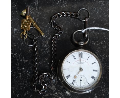 A vintage silver hallmarked English Express Lever pocket watch by J. Graves of Sheffield