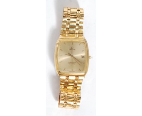 A vintage gentlemans late 20th century Omega Seamaster Quartz. Gold plated case and strap with square face, baton numerals an