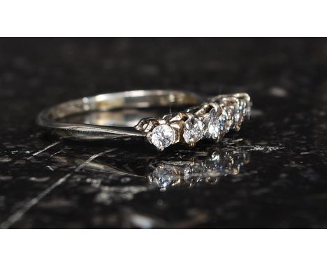 An 18ct gold, platinum and diamond ladies 5 stone ring. The 5 stones being claw mounted approx .40pnts. Weight 1.8g RS L/M