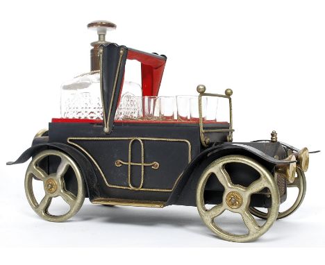 A novelty musical decanter and glass set in the form of a vintage motor car