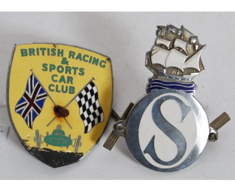 2 chrome and enamel car badges one with large ' S ' with galleon above. The other for the ' British Racing & Sports Car Club 