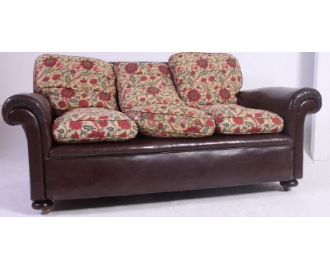 An excellent 1930's Art Deco leather Chesterfield club sofa settee, The frame upholstered in a good leather having tapestry L