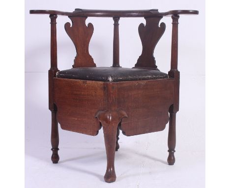 A 19th century Georgian mahogany corner chair commode. Raised on cabriole legs with deep frieze having drop in black faux lea