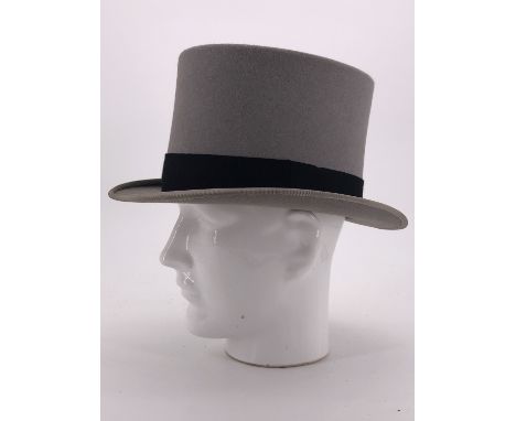 An R W Forsyth silk morning hat, size 6 7/8, and hide carrying case