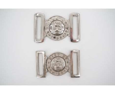 A Victorian British Army waist belt locket and one other