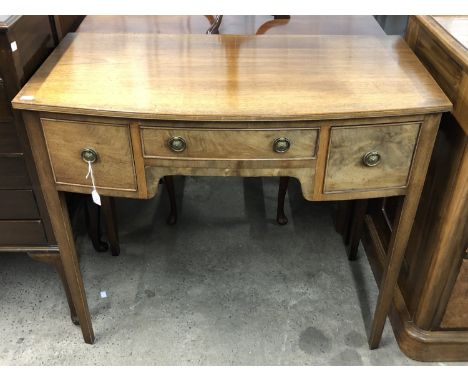 An old reproduction George III mahogany bow fronted dressing / writing table, 89 x 46 x 78 cm 