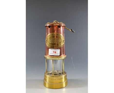 A reproduction British Coal Mining Company of Wales miner's lamp
