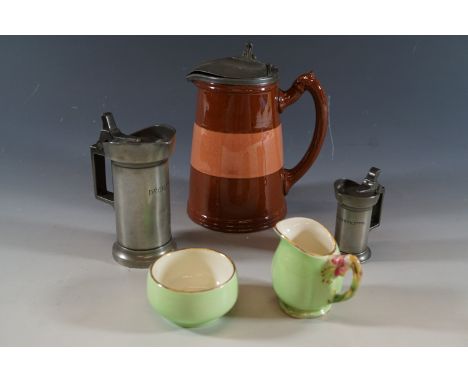 Two Victorian pewter measures, a Victorian lidded-jug and a Royal Winton toy or doll's sugar basin and milk jug