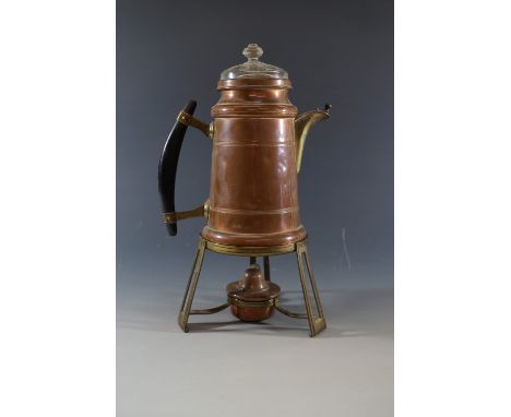 A copper coffee percolator and stand