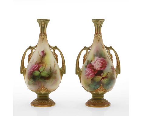 A pair of Royal Worcester vases, dated 1908, painted with roses by by AJ Lewis, with a blush ground, and twin handles, printe