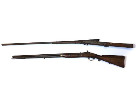 An Indian torador musket, 19th century, with an engraved lock, mechanism working, 153cm overall, and a percussion gun, stampe