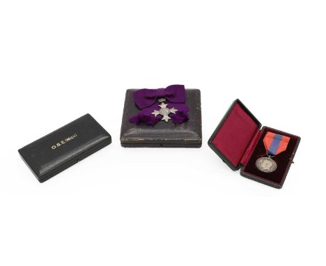 A George IV Most Excellent Order Of The British Empire, MBE.,  by Garrard & Co,MBE - Silver together with a OBE box, and a Im