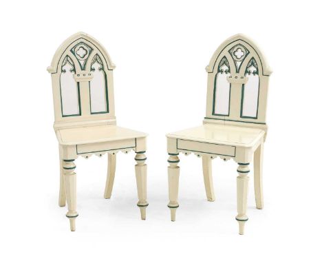 A pair of painted Gothic Revival hall chairs,  from the collection of Sir Frederick Ashton, 30th June 1993  46cm wide   42cm 