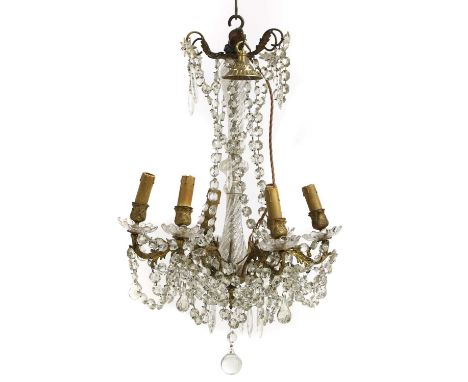 A French cut glass and gilt metal chandelier  20th century, 80cm high approx 44cm wide approx  Condition ReportPAT test - Pas