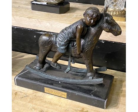 BRONZE GIRL ON ROCKING HORSE - 25 CMS (H) APPROX
