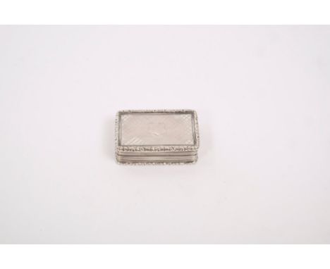 Victorian silver vinaigrette of rectangular form, with Tartan pattern decoration and foliate borders, hinged cover, opening t