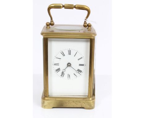 Late 19th century French carriage clock with eight day movement striking the half and hours, in brass case and original trave