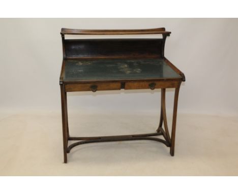 Unusual French Art Nouveau beech desk with rear gallery, the later top over pair of frieze drawers, on sinuous splayed suppor