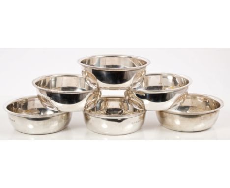 Set of six 1930s silver dishes of deep circular form, with bead rims (Birmingham 1932), maker - M. & J.  All at approximately