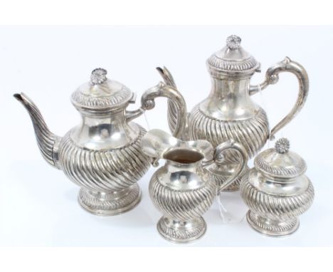 Continental silver four piece tea set - comprising teapot of baluster form, with wrythen decoration, scroll handle and domed 