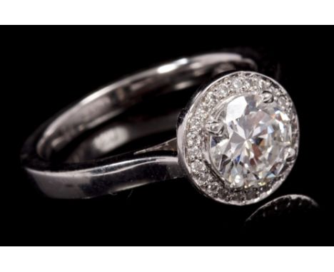 Diamond cluster ring, the halo-type cluster centred with a round brilliant cut diamond weighing 0.94 carats, with a circular 