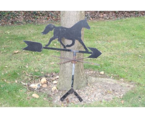 Wrought metal weather vane in the form of a horse, 90cm wide