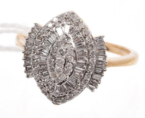 Diamond cluster ring, the marquise-shape cluster comprising brilliant and baguette cut diamonds, on gold (9ct) shank.  Ring s