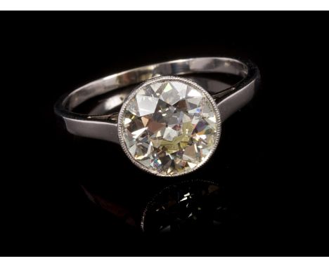 Diamond single stone ring, the old cut diamond estimated to weigh approximately 2.41 carats, in millegrain rub-over setting, 