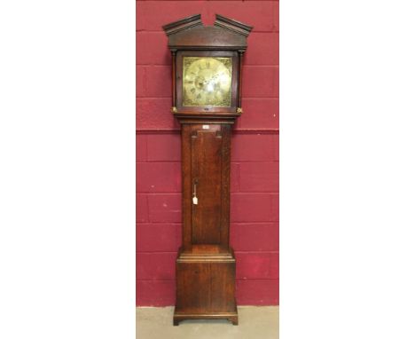 E. Burton, Kendal:  George III oak longcase clock, the signed brass 12 inch dial with date aperture, with twin train movement