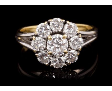 Diamond cluster ring, the flower-head cluster comprising nine brilliant cut diamonds estimated to weigh approximately 1.05 ca