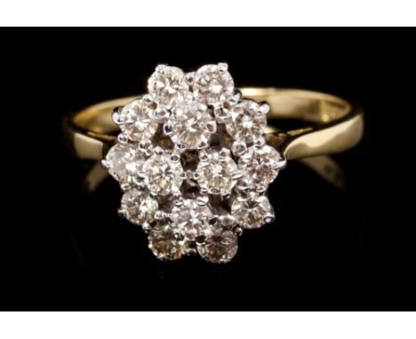 Diamond cluster ring, the oval cluster comprising fourteen round brilliant cut diamonds estimated to weigh 1.00 carat, in cla