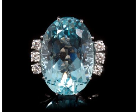 Aquamarine and diamond cocktail ring, the oval mixed cut aquamarine weighing approximately 7.95 carats, with six brilliant cu
