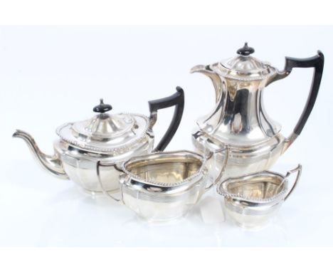 George V four piece tea set - comprising teapot of faceted form, with band of reeded decoration with gadrooned border, angula