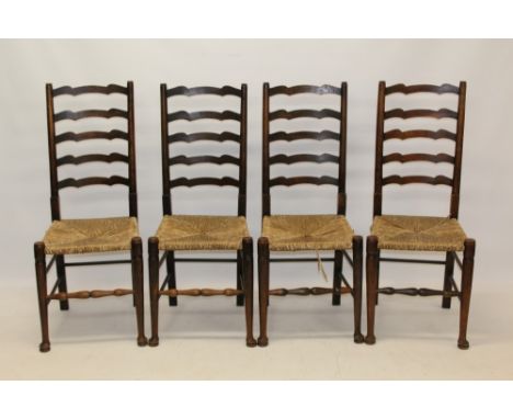 Set of nine late 19th / early 20th century rush-seated ladder back chairs of typical form, on turned understructure - to incl