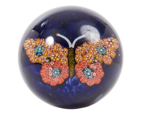 1930s / 1940s Paul Ysart glass paperweight decorated with a butterfly, each wing signed with a pink 'PY' cane, 7cm diameter  