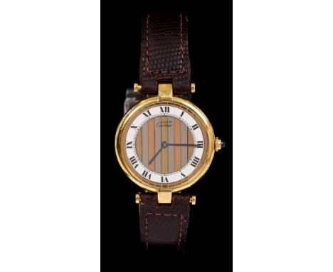 Cartier 'Must de Cartier' wristwatch with quartz movement, circular dial with white enamel chapter ring, on a striped three-c