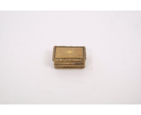 George IV silver gilt vinaigrette of rectangular form, with engine-turned decoration and cast foliate border, hinged cover, o