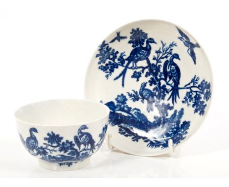 18th century Worcester blue and white tea bowl and saucer printed with birds among branches - blue crescent mark   CONDITION 