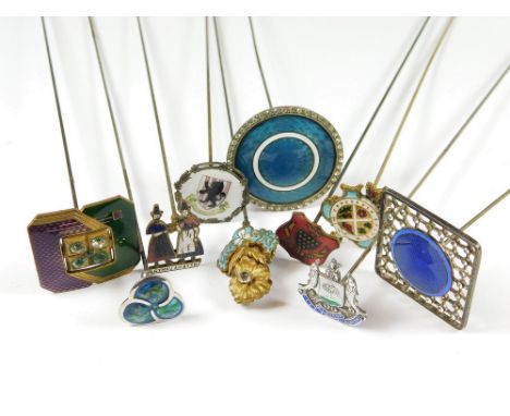 ENAMELLED HAT PINS. Ten various enamelled hat pins including a silver & enamel 'Let Glasgow Flourish' hat pin. Longest 29.5cm