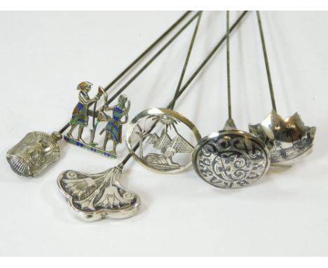 SILVER HAT PINS ETC. Six silver & silver plated hat pins including four Egyptian themed hat pins, one in hinged enamel. Also,