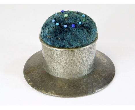 HAT PIN STAND. A Tudric pewter hat pin stand, No. 0875.  Please note that all items in this auction are previously owned & ar