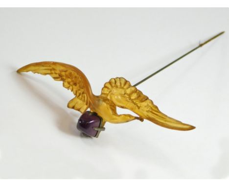 ART NOUVEAU HAT PIN. An Art Nouveau horn & amethyst hat pin. Max. width 12cm. Length 20.5cm.  All hatpins are in clean or rea