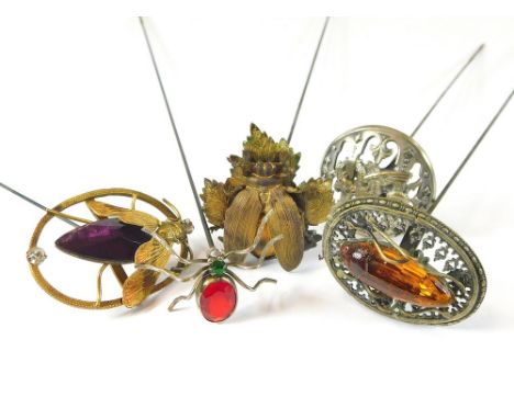 INSECT HAT PINS ETC. Four brass & white metal insect hat pins & a French white metal dragon hat pin. Longest 31cm.  All hatpi