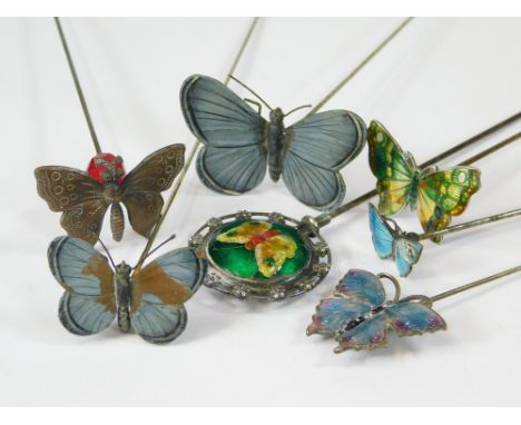 BUTTERFLY HAT PINS. Seven various butterfly hat pins in silver & enamel, painted metal etc. Longest 25.5cm.  All hatpins are 